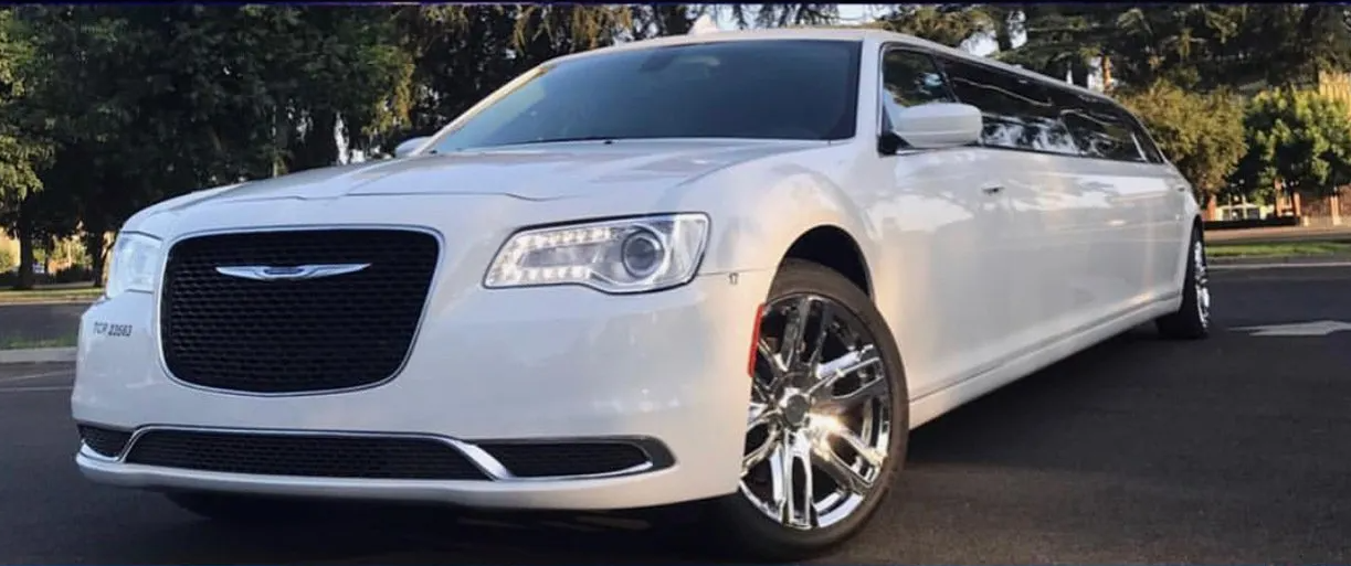 Luxury White Limousine with Blue Lights Inside — Ceres, CA — Luxury Limousine