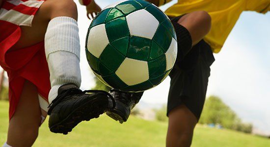 Two Player Kicking Ball - Chiropractic Care in Bellefontaine OH