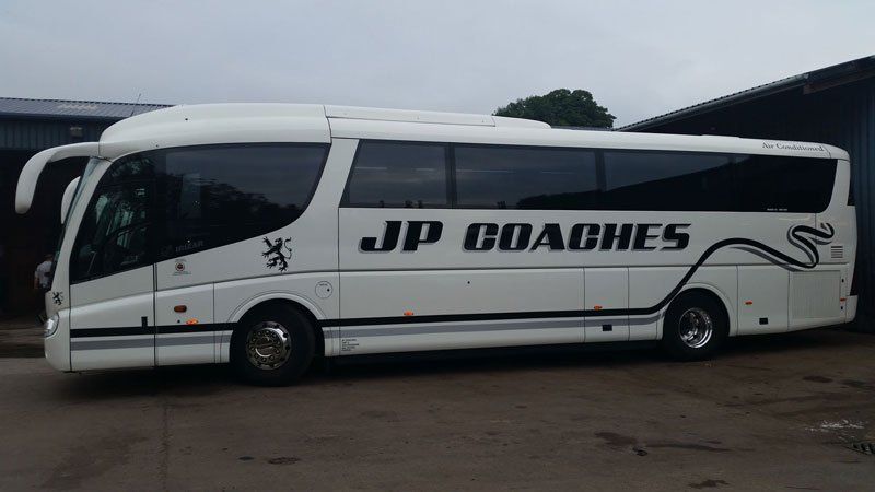 JP Coaches bus side view