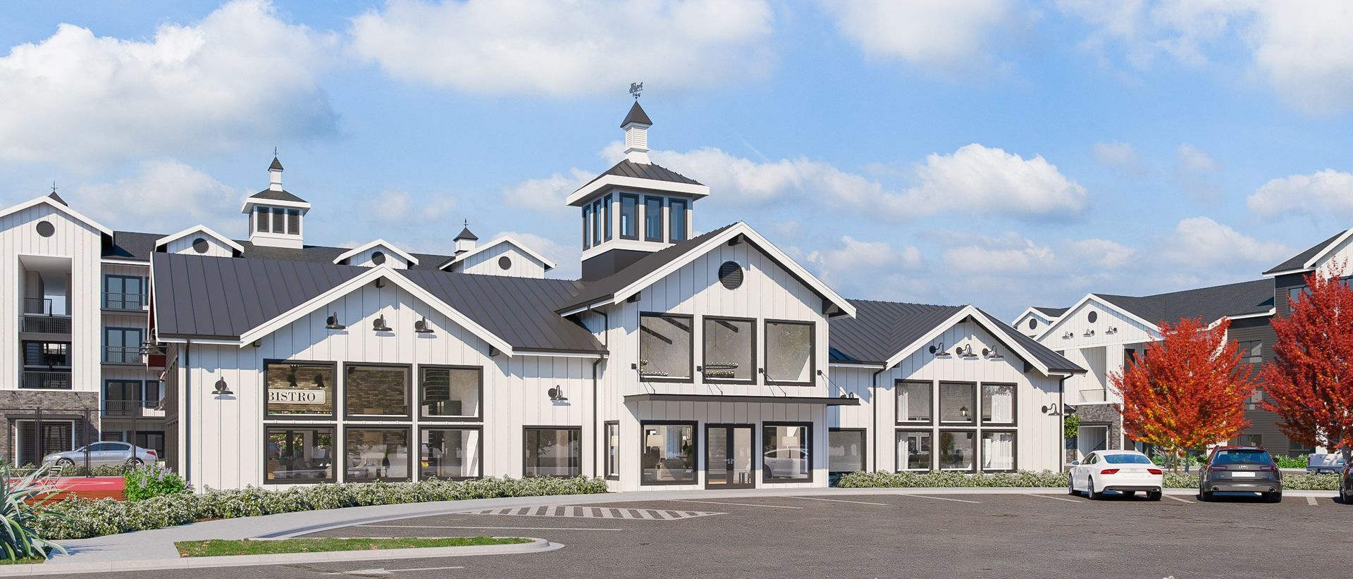 An artist 's impression of a new apartment building with cars parked in front of it.