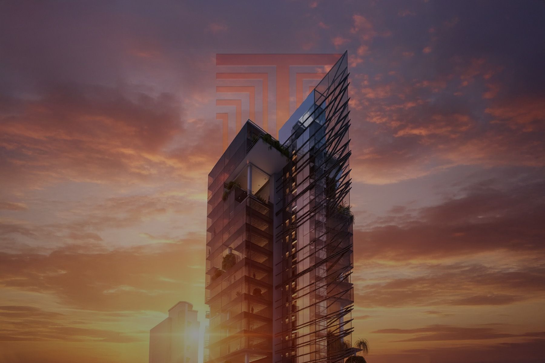 Skyscraper against a sunset sky. The building has a modern, angular design with a glass facade.