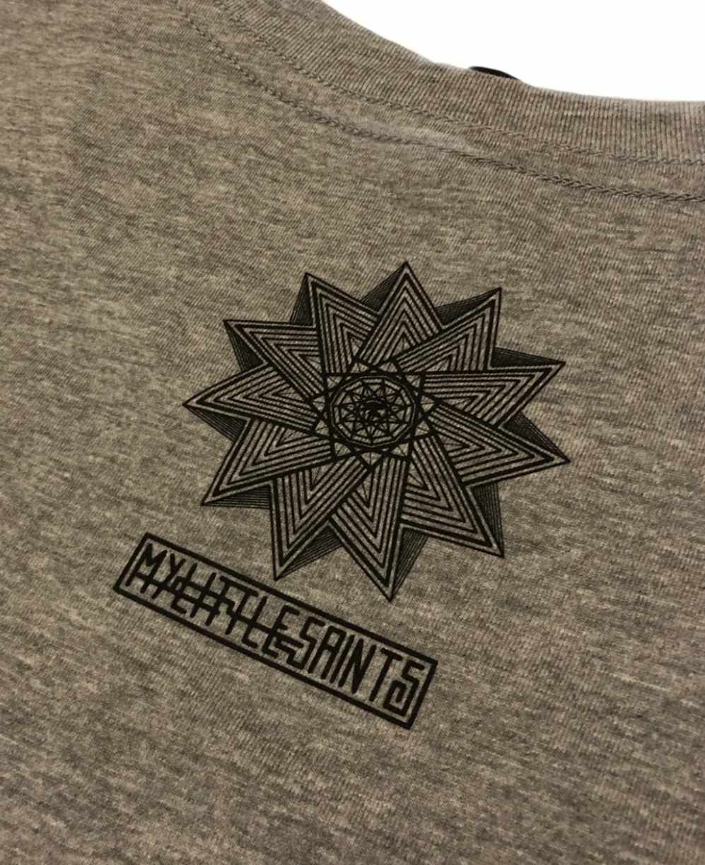 The Letter R Is Being Embroidered on A Blue Shirt — CKM Screen Printing in Erina, NSW