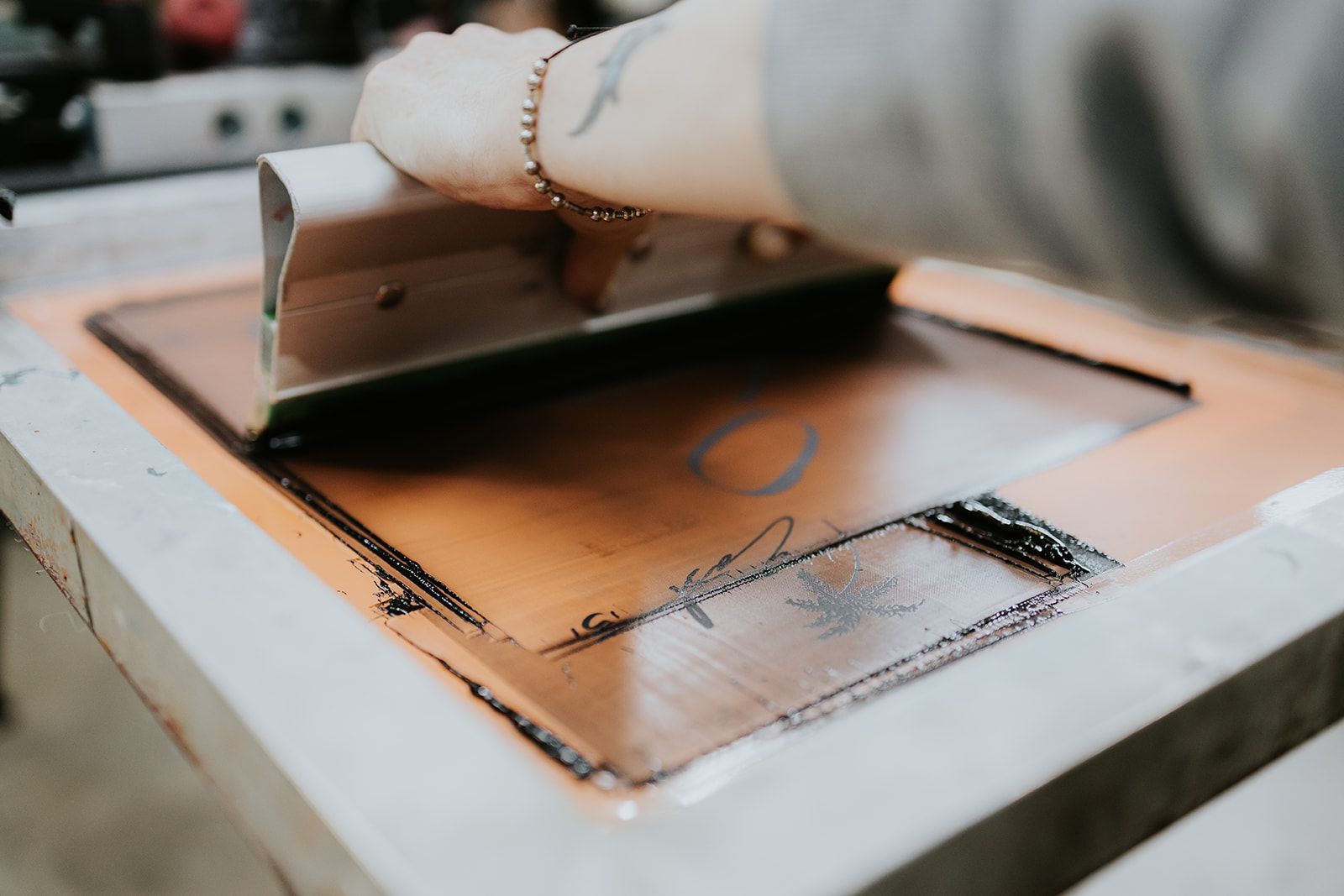 Close up of Someone Screen Printing — CKM Screen Printing in West Gosford, NSW
