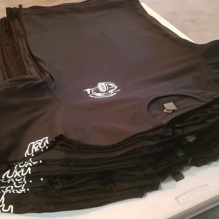 A Pile of Black T-shirts — CKM Screen Printing in West Gosford, NSW