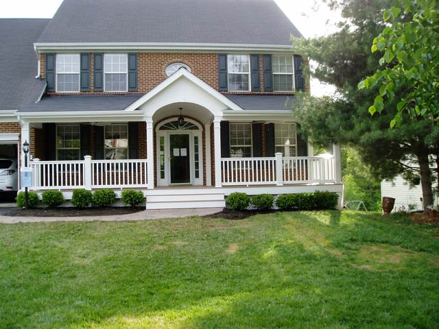 Lattice Fences — Big house with blue roofing in Woodbridge, VA