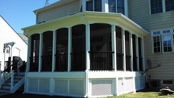 Pouring A Concrete Slab — House deck with black windows in Woodbridge, VA