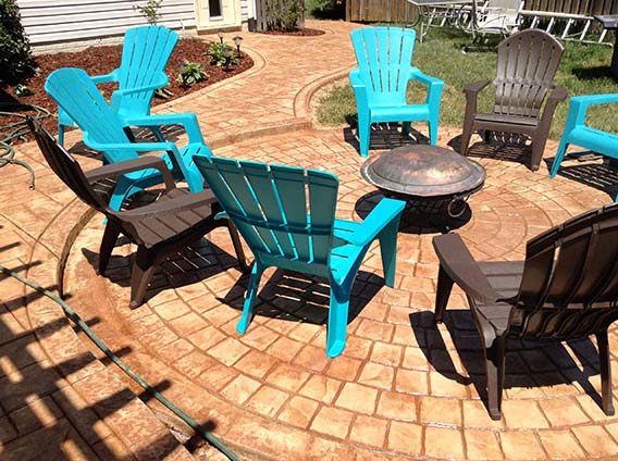 Indoor Living Space — Eight chairs in round concrete floor in Woodbridge, VA