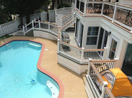 Wood Workbench — Swimming pool outside of house in Woodbridge, VA