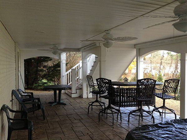 Home Remodeling — Black chairs and table in Woodbridge, VA