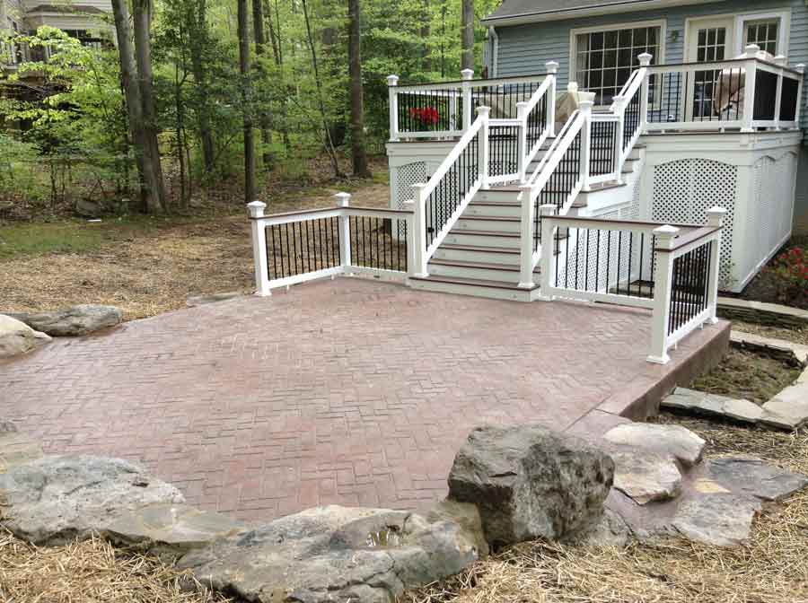 Aisle — House concrete flooring and big stones in Woodbridge, VA