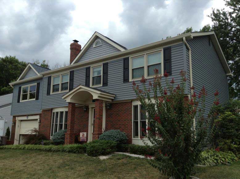 Kitchen Upgrade — Big house with blue siding in Woodbridge, VA