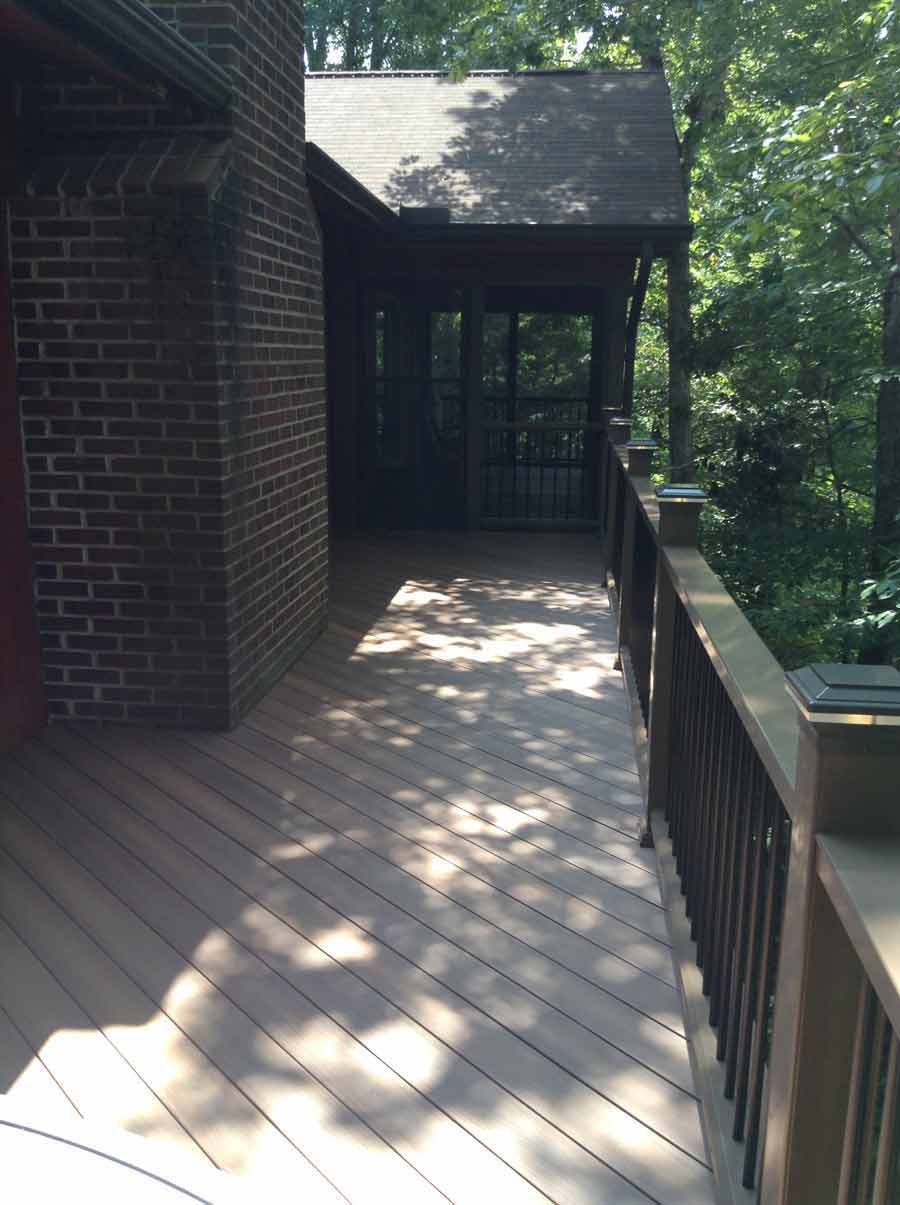 Exterior Wall Coatings — Wooden deck with wooden fence in Woodbridge, VA