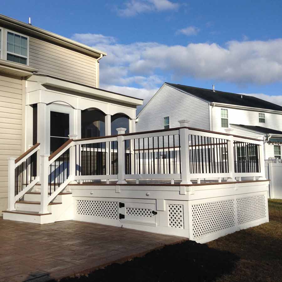 Flat Roofing — White deck and fence in Woodbridge, VA