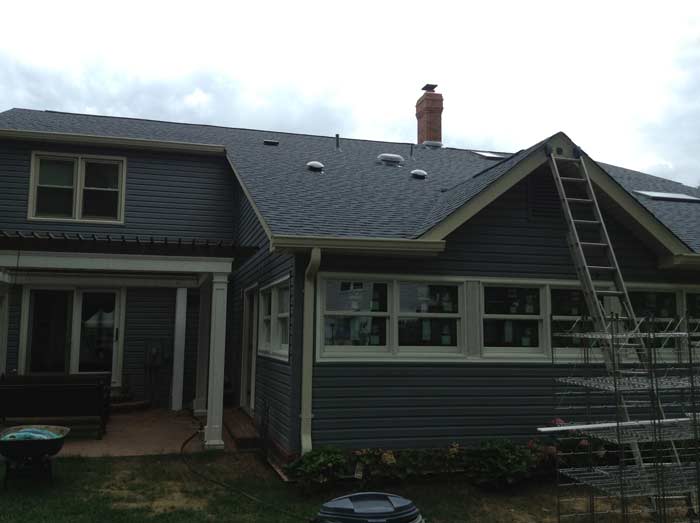 Concrete Work — House with blue roof and siding in Woodbridge, VA