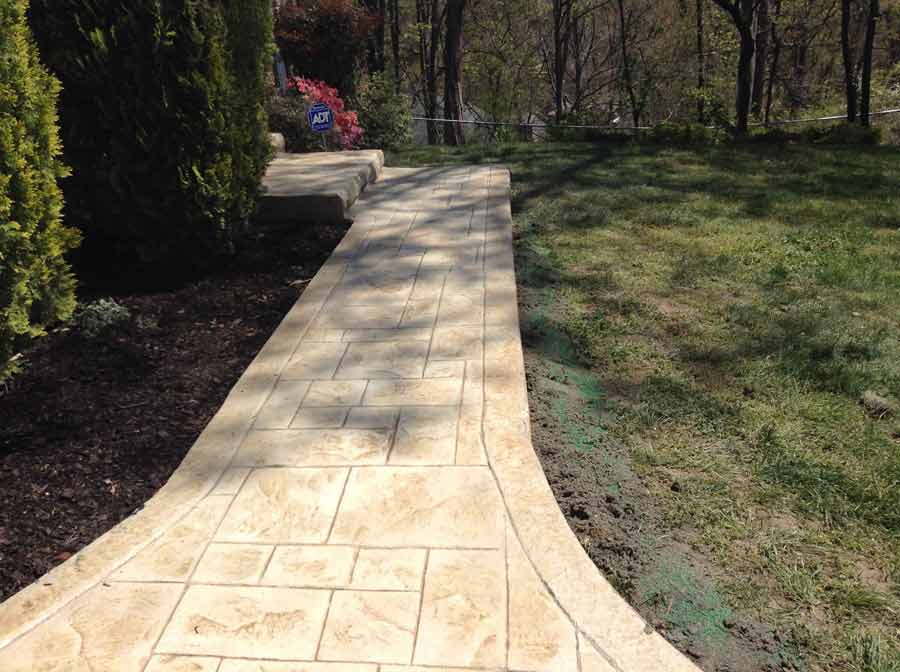 Kitchen Remodel — Concrete walkways besides the garden in Woodbridge, VA