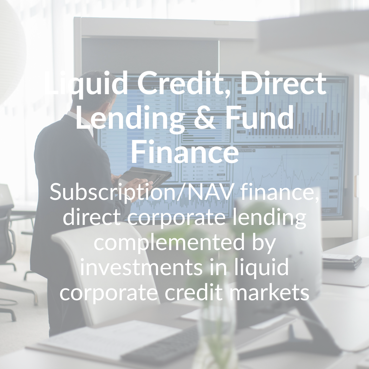 Man in suit at desk with computer screens; text: Liquid Credit, Direct Lending & Fund Finance.