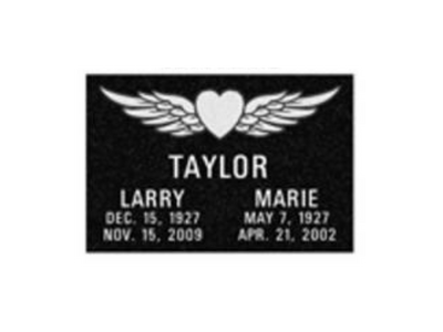 A black gravestone with a heart and wings for larry and marie