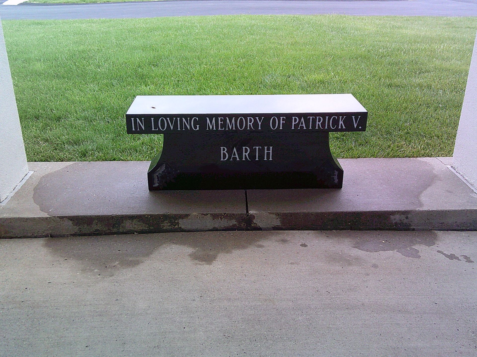 A gravestone in a cemetery with the name kuchnicki on it