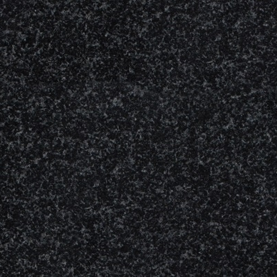 A close up of a black granite counter top.