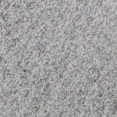 A close up of a granite surface with a gray and white texture.