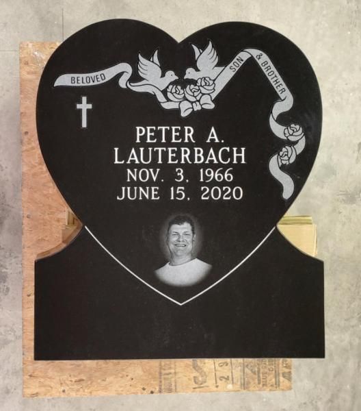 A heart shaped grave marker for peter lauterbach