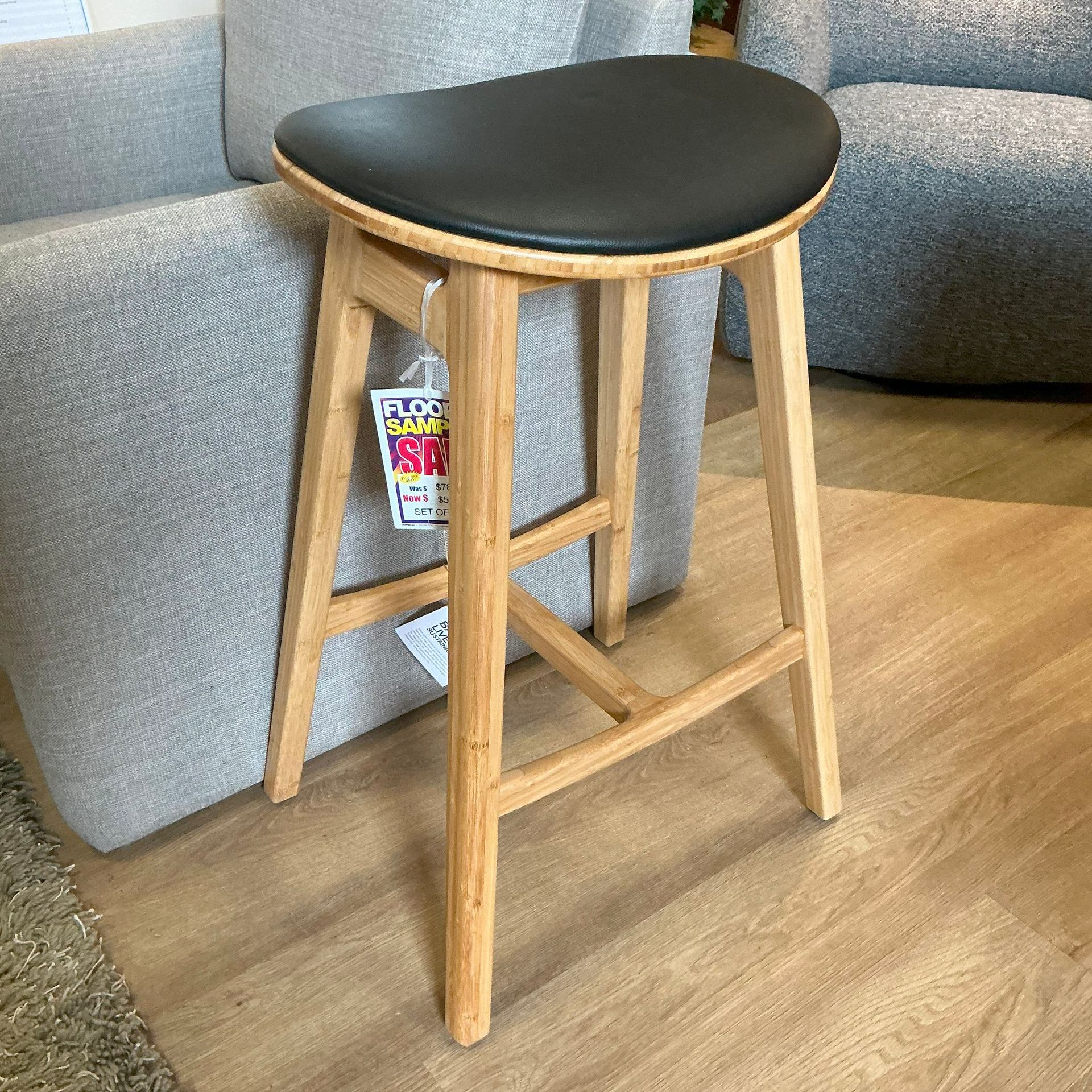 Counter height stool in natural bamboo with black leather seat