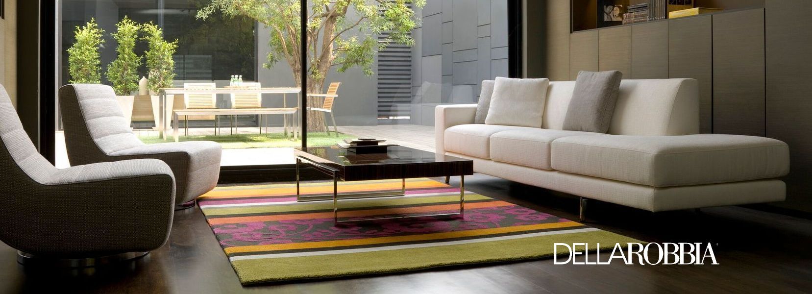 Dellarobbia Monti one arm sofa with bumper and optional toss pillows.