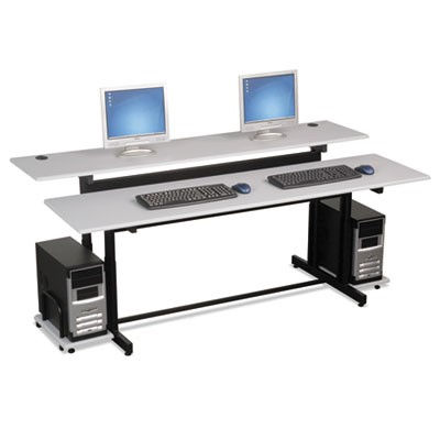 A computer desk with two monitors and two keyboards on it.