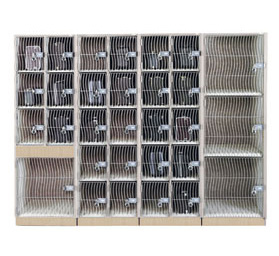 A row of shelves filled with lots of cages on a white background.