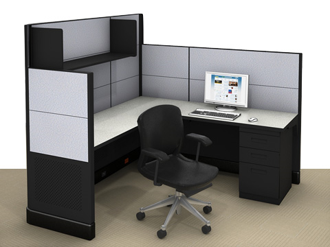 An office cubicle with a computer on the desk