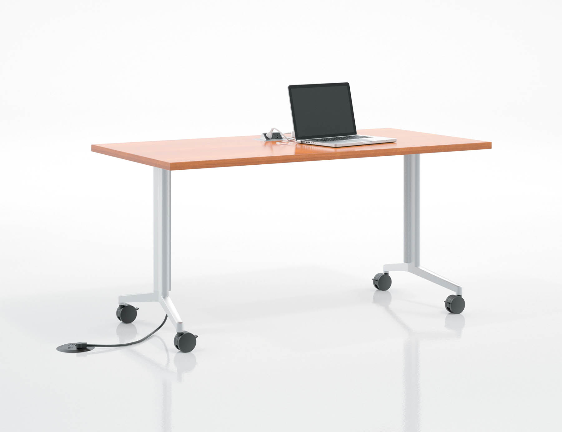 A laptop computer is sitting on top of a wooden table.