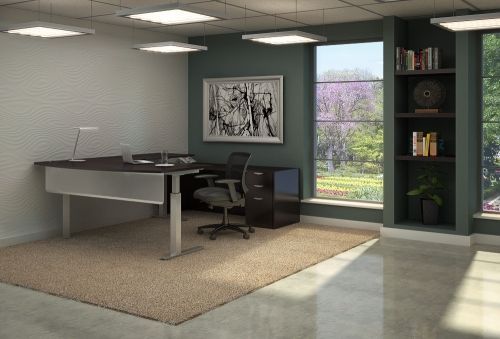 A room with a desk and a chair in it