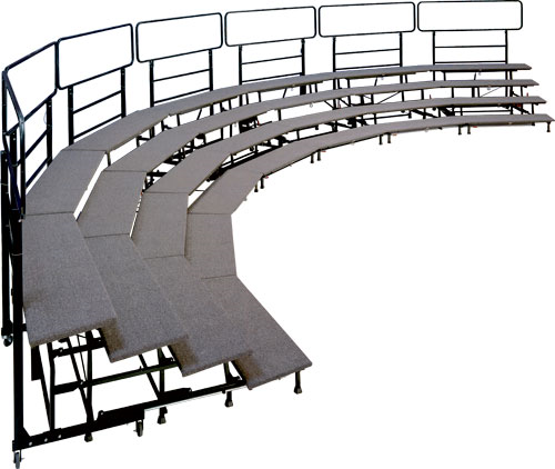 A row of curved bleachers with a metal railing