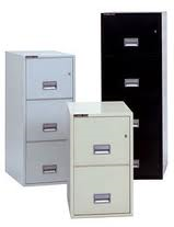 Three filing cabinets are sitting next to each other on a white background.