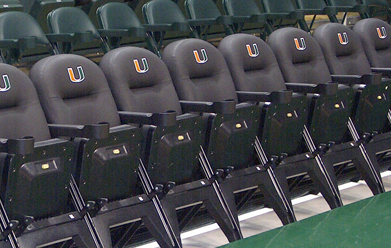 A row of stadium seats with the letter u on them