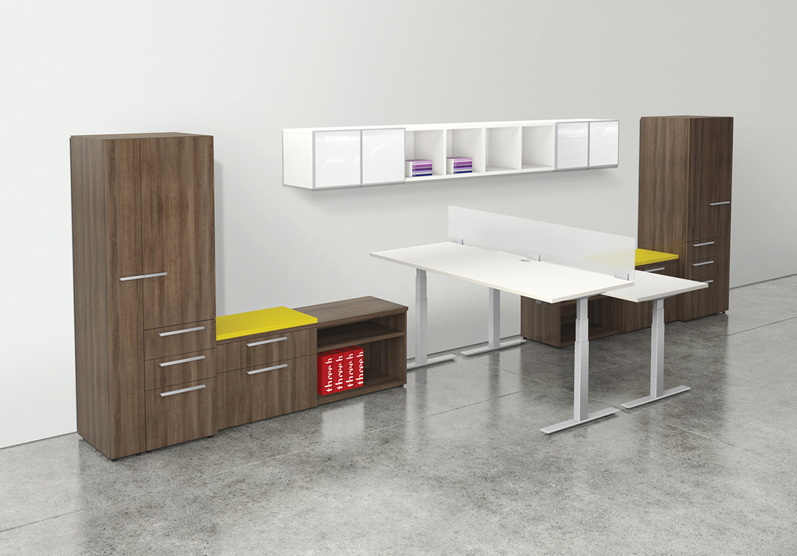 A room with a table , cabinets , and a shelf on the wall.