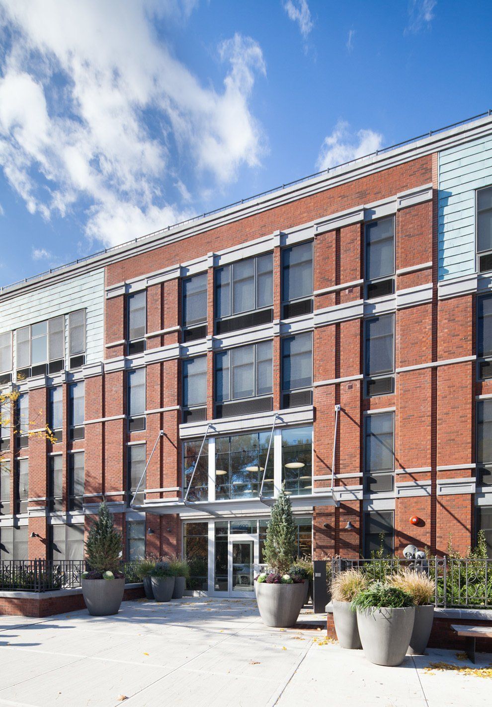 A large brick building with a lot of windows