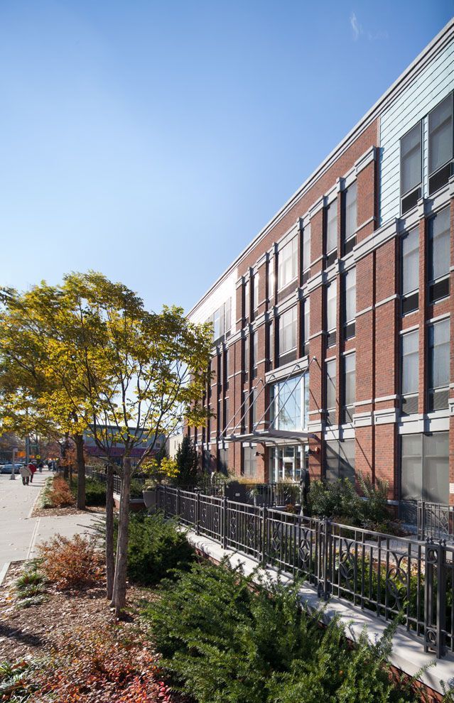 A large brick building with a lot of windows