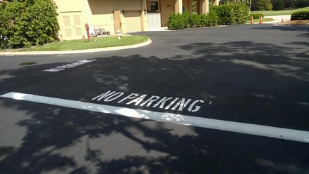 No Parking Sign on the Road — Fort Myers, FL — Southwest Florida Sealcoating