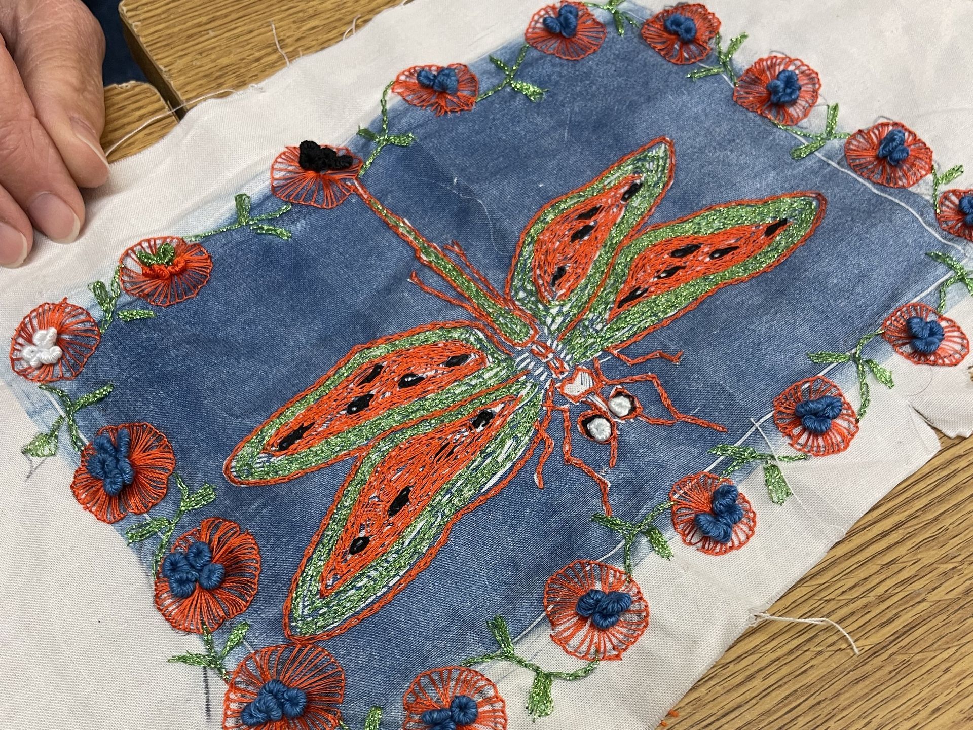 An embroidered dragonfly