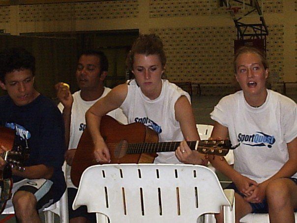 Sports mission team singing together