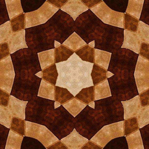 A brown and white kaleidoscope with a star in the center