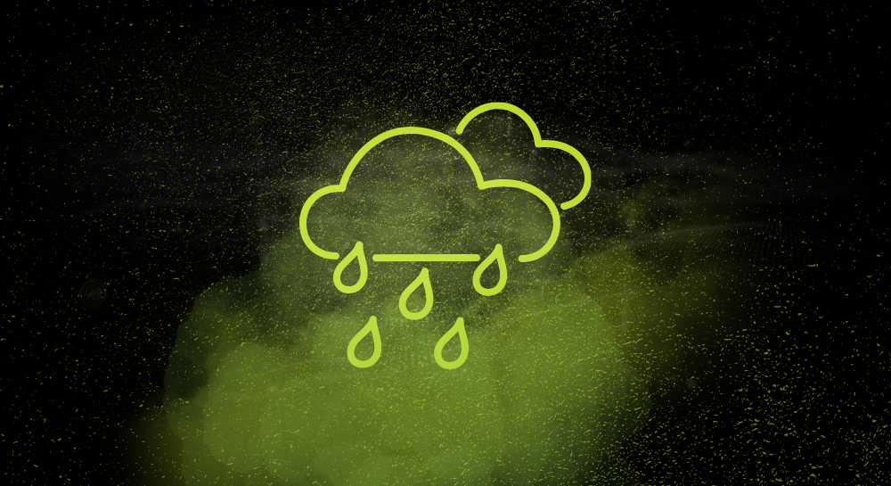 Neon yellow cloud with rain on a black smoky background