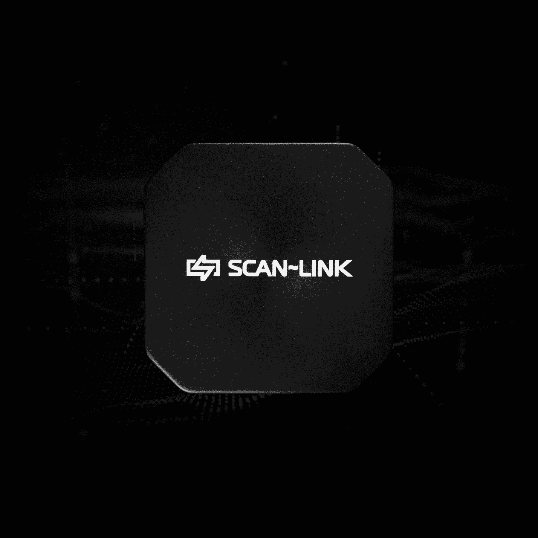 Black Scan-Link device with a red button, circular lights, and WiFi symbol on a black background.