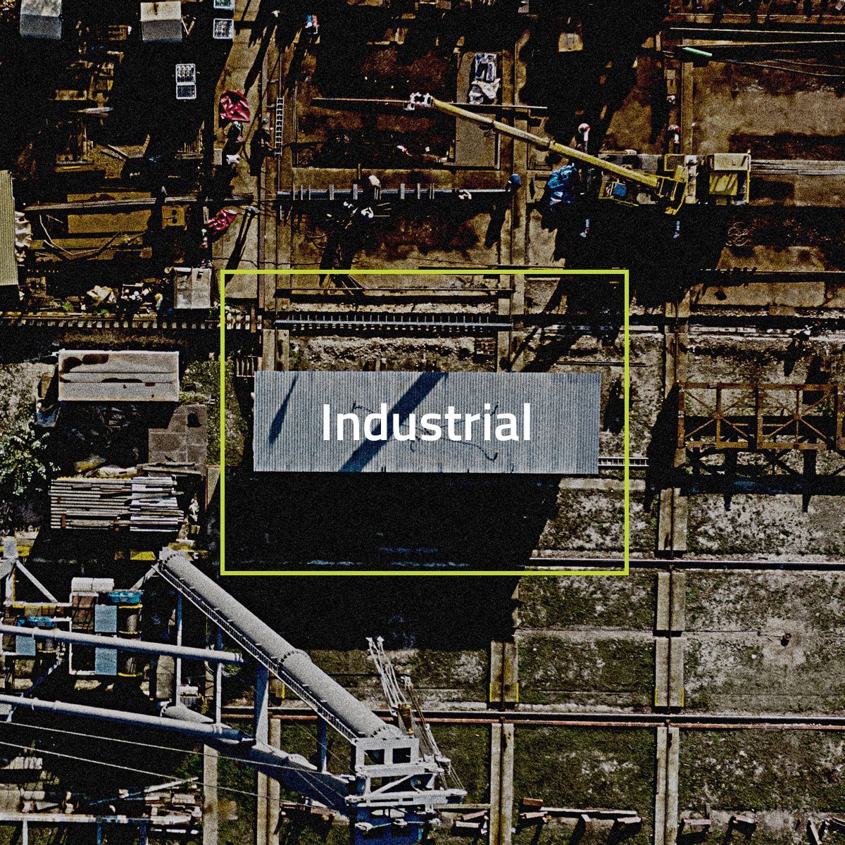 An aerial view of a construction site with a sign that says industrial