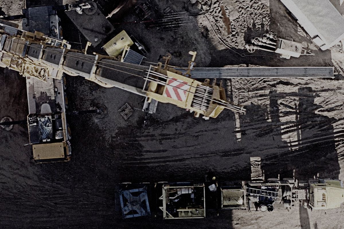 An aerial view of a construction site with lots of machinery
