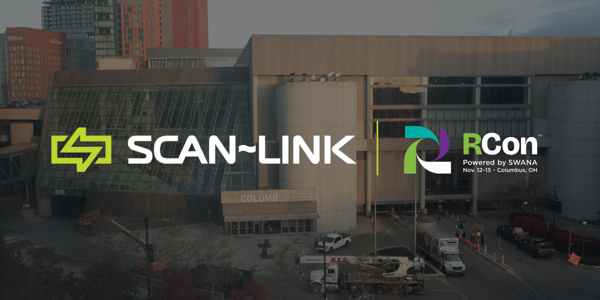 Scan-Link and RCon logos in front of a large building.