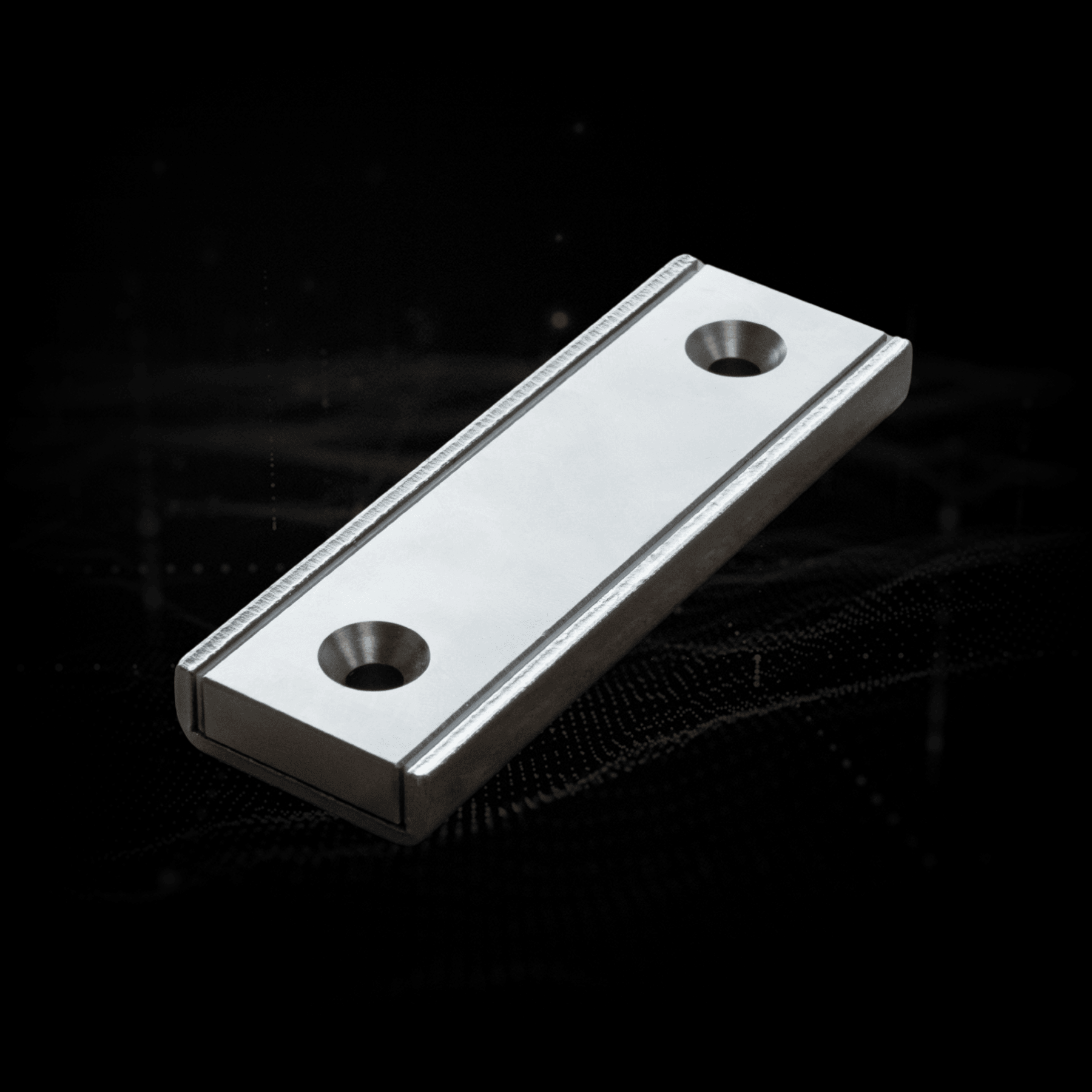 Two yellow, rectangular panels side by side, with a remote control to the right. Dark background.