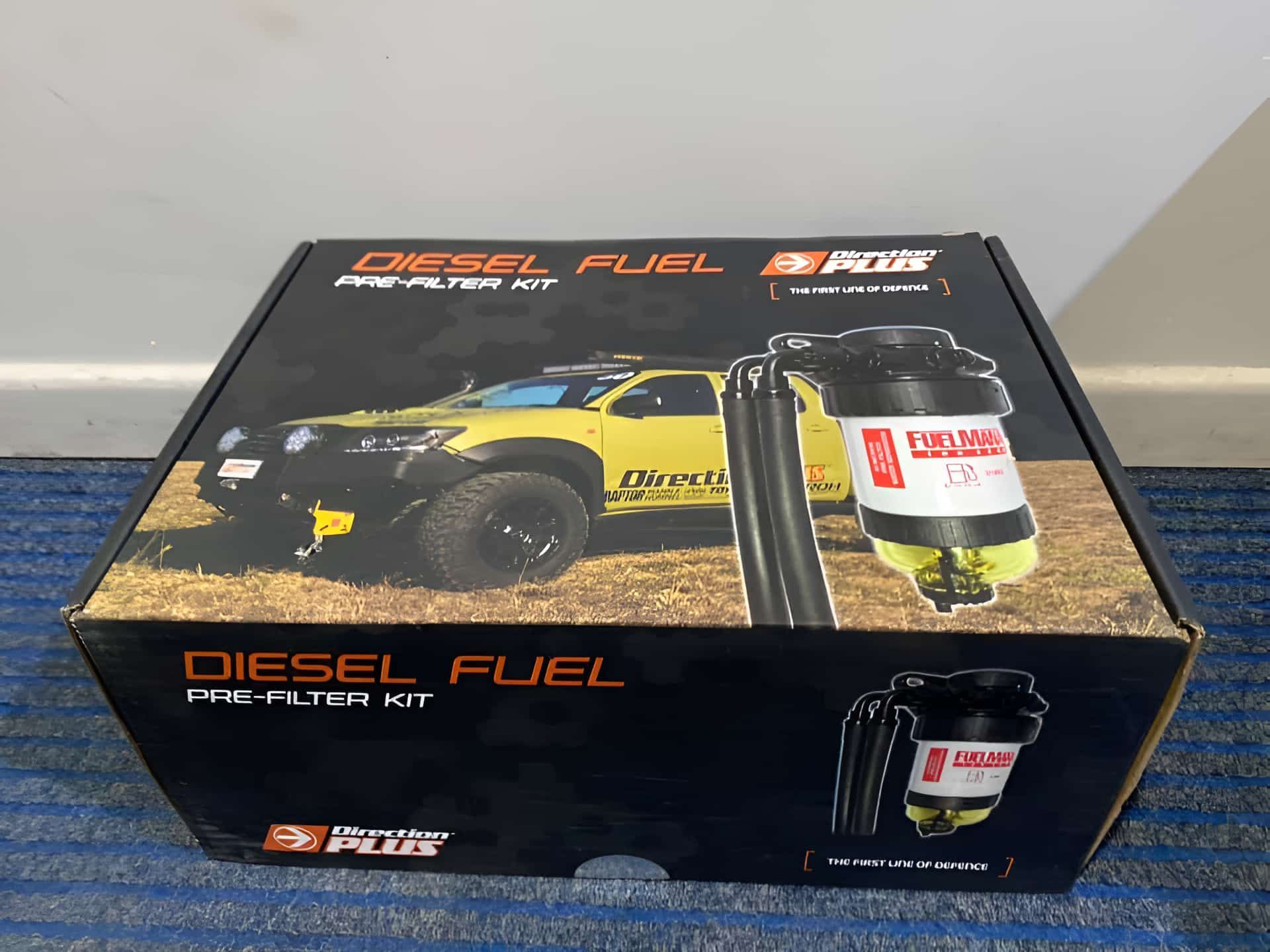 A Box Of Diesel Fuel Is Sitting On A Blue Carpet — Filta-Wash Mackay In North Mackay, QLD