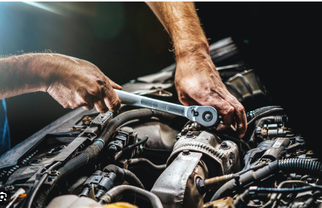 A Mechanic Working On A Car — Filta-Wash Mackay In North Mackay, QLD